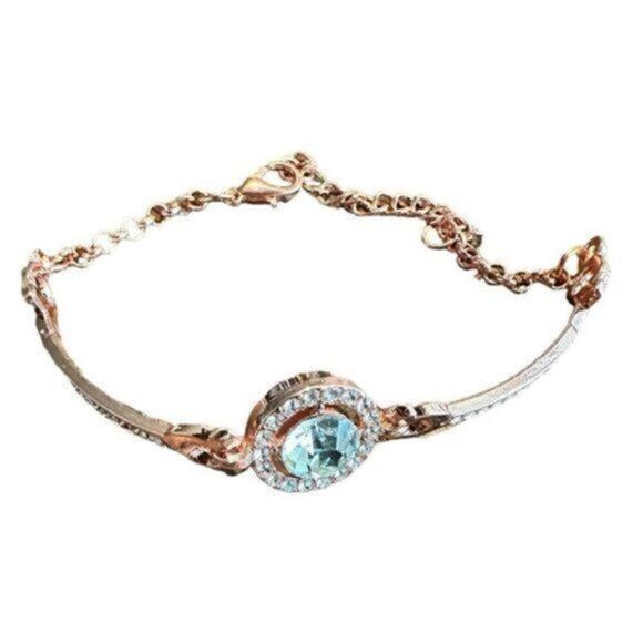 NWT - Rose Gold Bracelet with Solitaire Center Smaller Gems along each side - Picture 1 of 4